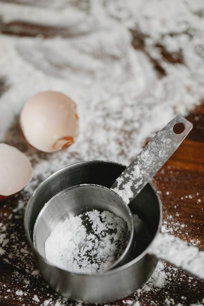 measuring cups with leftover flour