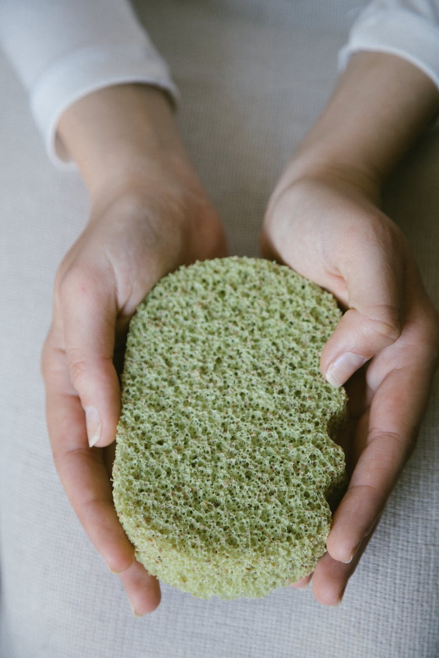 sponge on a persons hand